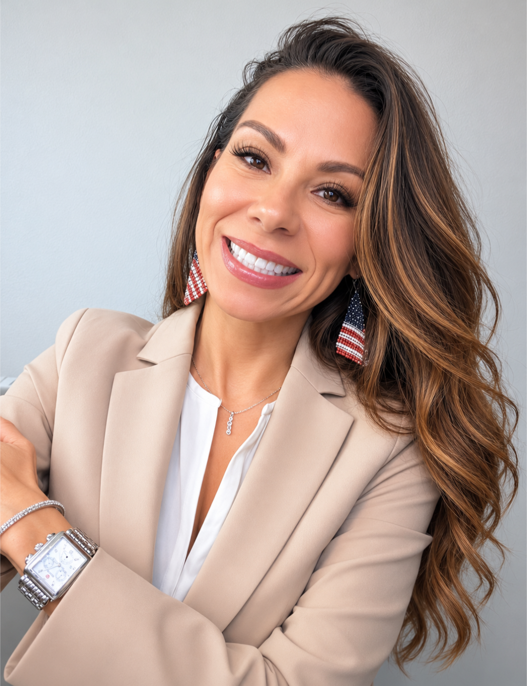 Rita Crockett, Founder of Automated Woman Advisory, smiling in a cream blazer